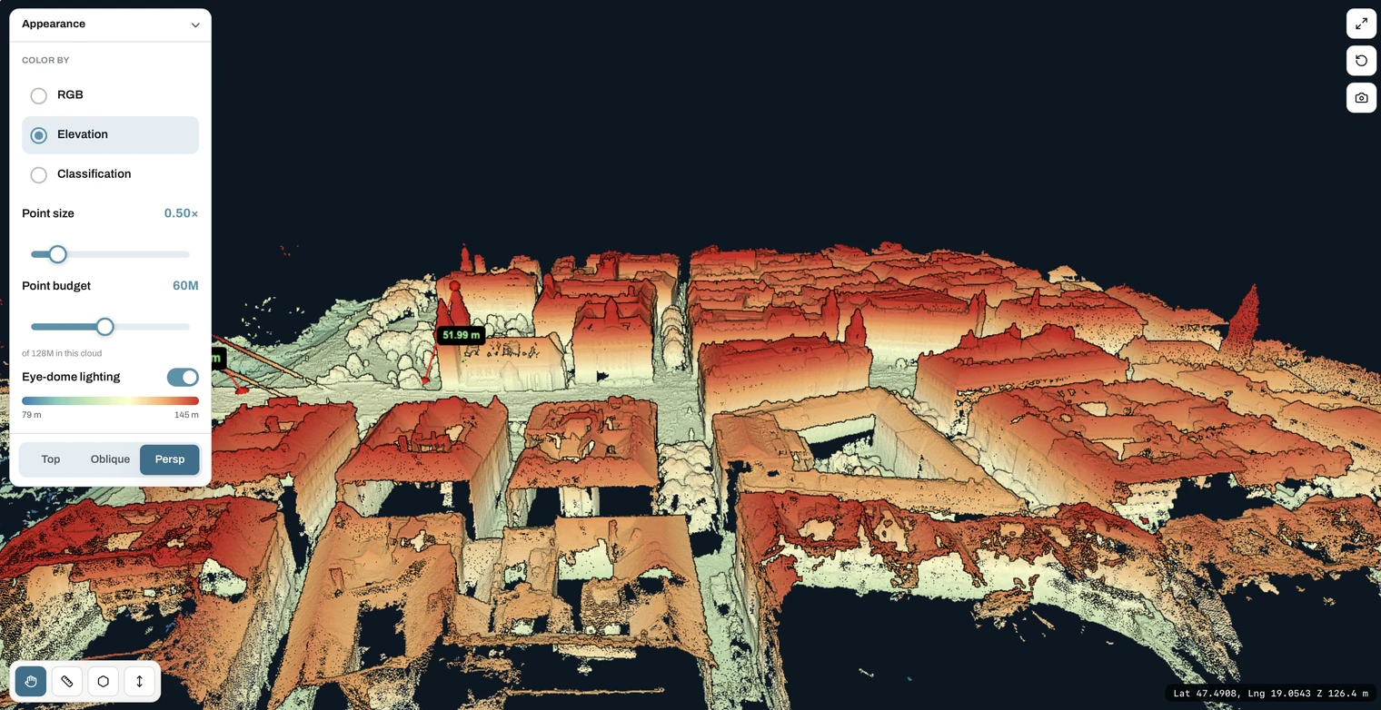 Point cloud coloured by elevation, showing terrain and building heights
